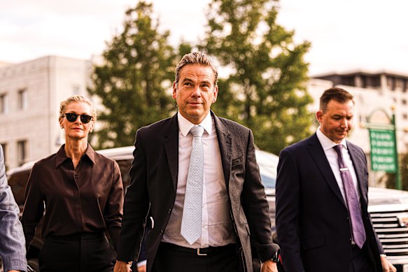 Lachlan Murdoch arrives, with his wife Sarah, for a probate court hearing in Nevada last September.