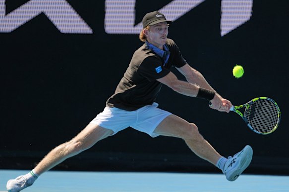 Dan Sweeny lunges for a ball in his match against Gael Monfils.