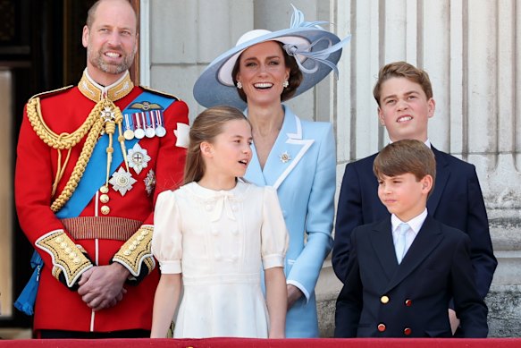 William, Prince of Wales, Princess Charlotte of Wales, Catherine, Princess of Wales, Prince George of Wales and Prince Louis of Wales watch an RAF flypast from the balcony of Buckingham Palace during Trooping The Colour on June 13. 