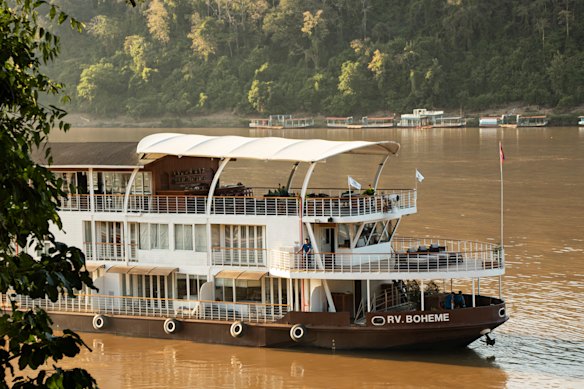 The RV Boheme cruising the Mekong in Laos.