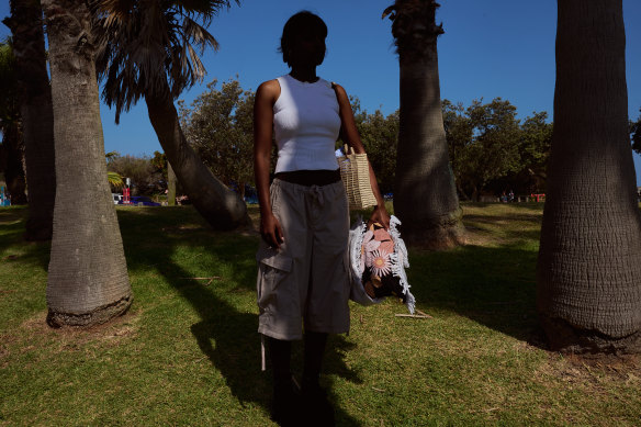 Meg, who has withheld her real name for privacy reasons, holds items she has stolen over the years.