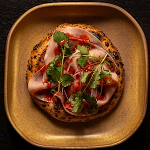 Sourdough flatbread with burnt chilli jam and Laughing Cow cheese.