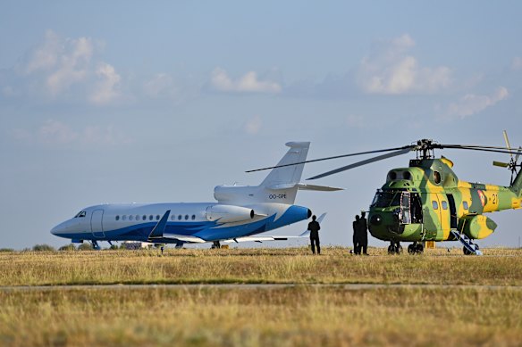 A Romanian military helicopter next to von der Leyen&rsquo;s plane in Romania on Monday.