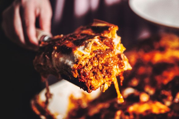 Marta likes to make lasagne for her family.