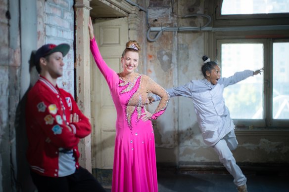  Hannah Fox with breakdancers Michael Fox and Demi Sorono in the Flinders Street Station Ballroom.