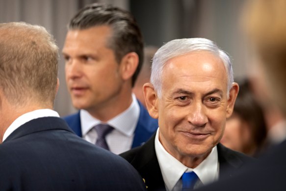Israeli Prime Minister Benjamin Netanyahu arrives with US Secretary of Defence Pete Hegseth for a meeting at the Pentagon last month.