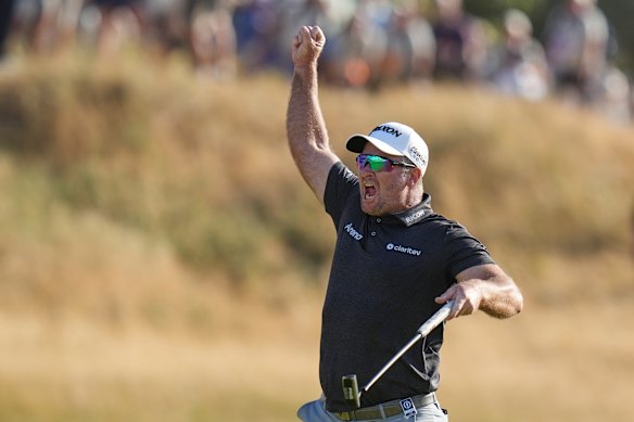 Ryan Fox of New Zealand celebrates on the 18th green after winning the British Open. 