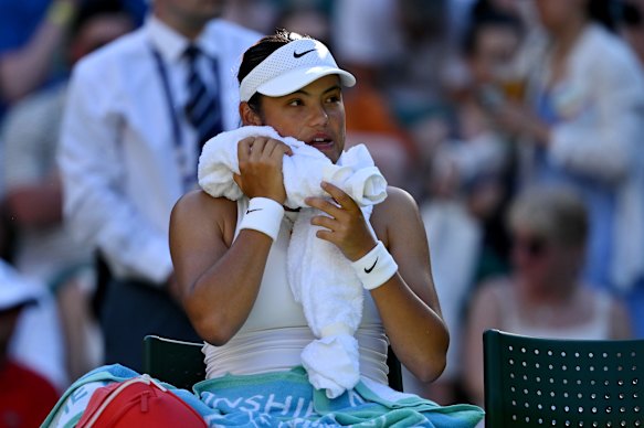 Great Britain’s Emma Raducanu cools down between sets at Wimbledon got off to a hot start on Monday.