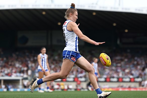 Roos star Tahlia Randall gets a kick away during the preliminary final.