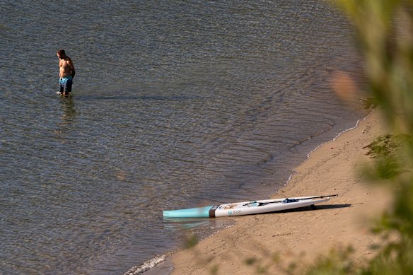 A swimmer takes a dip at Parriwi Beach in Mosman on Friday during Sydney’s heatwave.