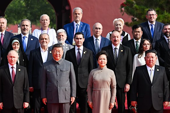 Former Victorian premier Dan Andrews (top right) posing behind Kim Jong-un, Xi Jinping and Vladimir Putin.