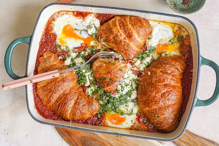 Shakshuka meets savoury bread-and-butter pudding in this share-friendly brunch dish.
