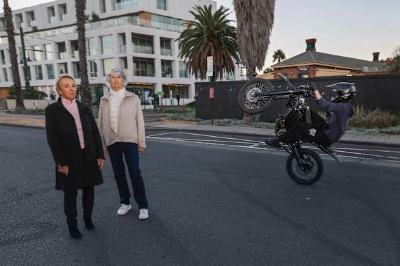 Port Melbourne residents Marion Sitter (left) and Heather Brown are desperate for help from Port Phillip Council, the state government and police over hooning in their neighbourhood. As the women had their photograph taken, a hoon motorcyclist sped behind them.
