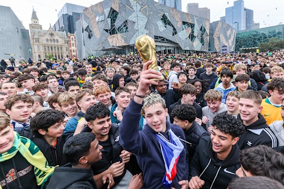 Rowdy fans sang and chanted before the World Cup watch party at Federation Square, Melbourne between Australia and Paraguay.