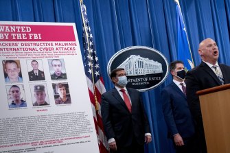 A poster showing six wanted Russian military intelligence officers is displayed in Washington in October.