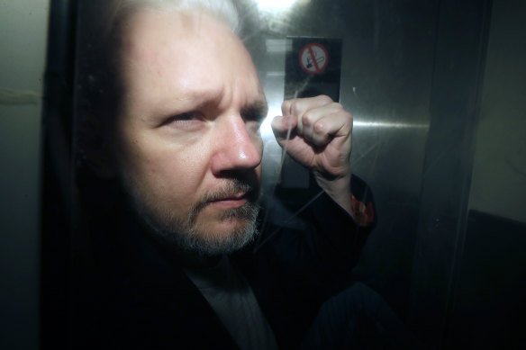 WikiLeaks founder Julian Assange being taken from court in London in 2019.