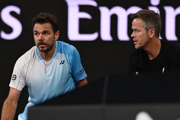 Stan Wawrinka seeks support from his coach Magnus Norman during his third round loss to Taylor Fritz during the 2026 Australian Open. 