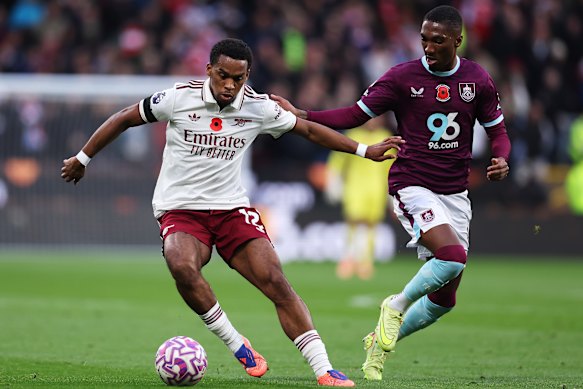 Arsenal’s Jurrien Timber battles for possession with Jaidon Anthony of Burnley.