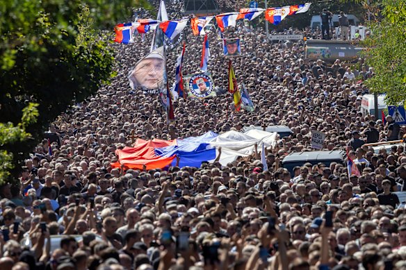 Thousands gathered for the funeral procession for war criminal and former Bosnian Serb army commander Ratko Mladić in Belgrade, Serbia, on Monday.