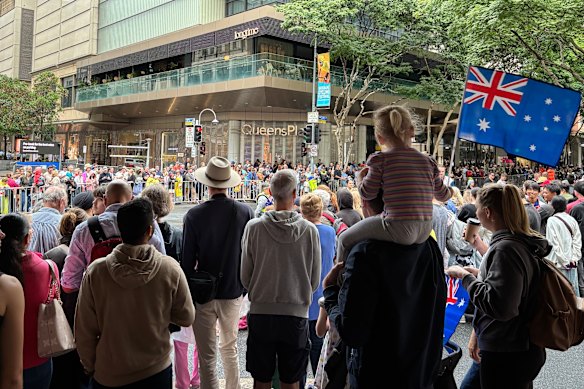 Crowds turn out along Adelaide Street for Brisbane’s Anzac Day parade.