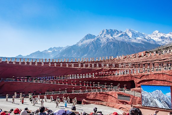 A performance set against the dramatic landscape of Jade Dragon Snow Mountain.