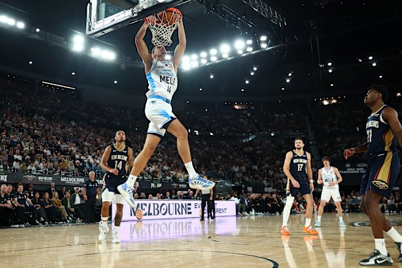 Melbourne United’s Jesse Edwards soars for a dunk the NBAxNBL clash with New Orleans Pelicans in October.