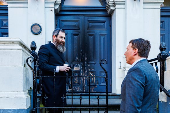 Rabbi Dovid Gurnick (left) and Dvir Abramovich of the Anti-Defamation Commission outside the East Melbourne Synagogue on Saturday.