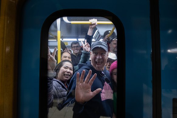 Passengers board the first rain to leave for the new Metro Tunnel at Pakenham East on Sunday