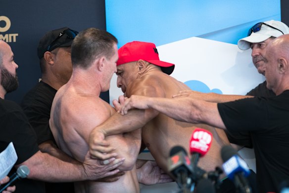 Fisticuffs: Paul Gallen and John Hopoate had to be separated when tensions bubbled over at their weigh-in. 