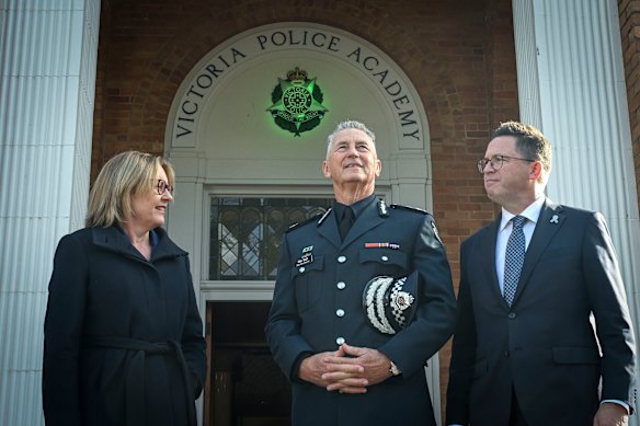 Bush with Premier Jacinta Allan and Police Minister Anthony Carbines after his swearing-in on Friday.
