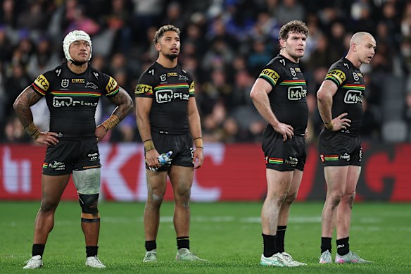 Penrith’s Brian To’o, Izack Tago, Liam Martin and Dylan Edwards watch the big screen during their match against the Bulldogs.
