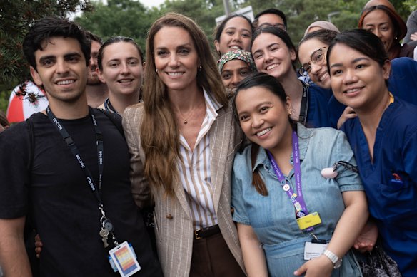 The Princess of Wales posed with staff during her visit. She praised the continuity of care the hospital provided.
