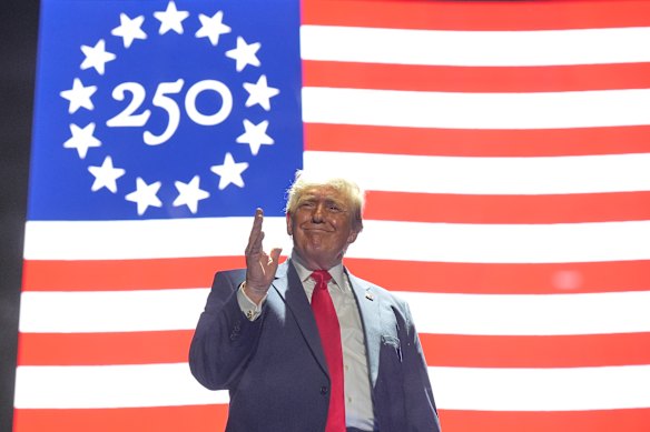 President Donald Trump celebrates the opening of the Great American State Fair on the National Mall in Washington last week.