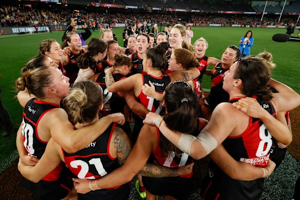 The Bombers celebrated a win over the Hawks at Marvel Stadium to mark the start of season seven.