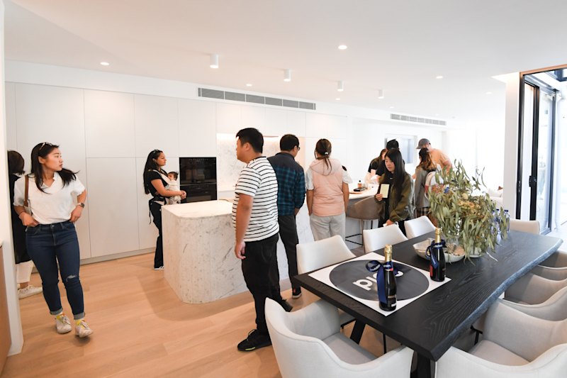 The beautifully styled home drew a big huge crowd of at least 40.