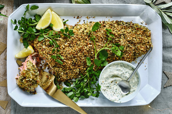Baked salmon with a pine nut, herb and chilli crust, served with dill and caper sauce.