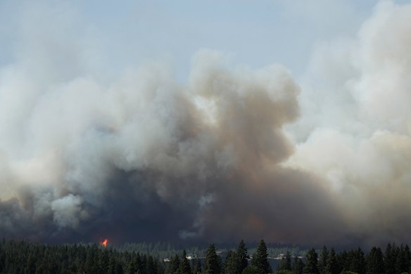 The Old Trails fire burns near Spokane on Saturday.