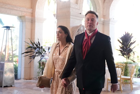 Elon Musk and Shivon Zillis arrive at Donald Trump’s The Mar-a-Lago Club earlier this year.