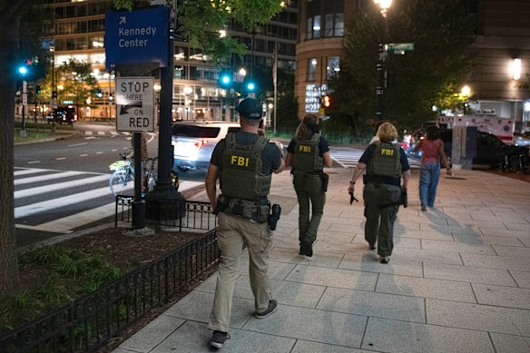 FBI agents patrol the Foggy Bottom neighbourhood of Washington, DC, on Thursday.