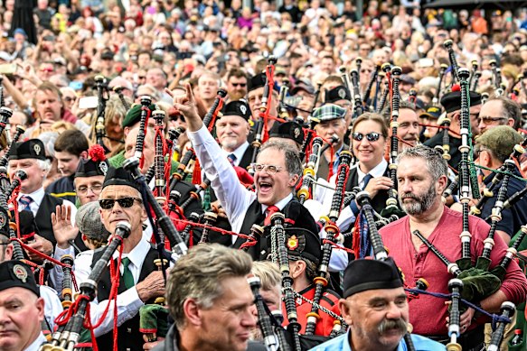 Hundreds of pipers were piping in Melbourne’s Federation Square to break a world record in honour of AC/DC.