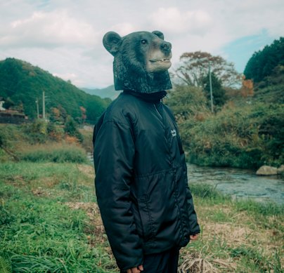 Sora Matsuda, a local government worker, dressed up as a bear for the hunting simulation in Chizu, Tottori Prefecture.