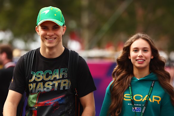 Piastri and girlfriend Lily Zneimer in the paddock at Albert Park.