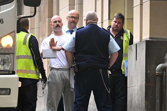 Thomas Sewell (centre) arrives at the Supreme Court of Victoria in Melbourne on Wednesday.