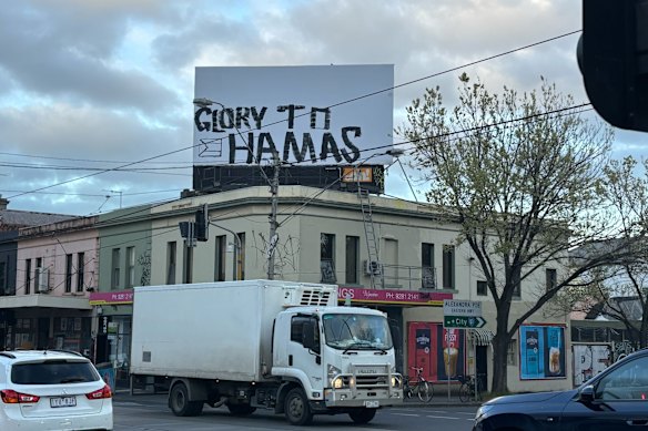 A prominent billboard in Fitzroy has been vandalised with a pro-Hamas message on the anniversary of the October 7 attacks.