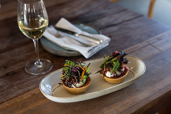 Parmesan custard tart with beetroot sauce.