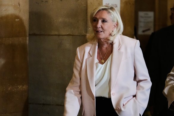 Far-right leader Marine Le Pen arrives at the courtroom for the verdict of her appeal in Paris.
