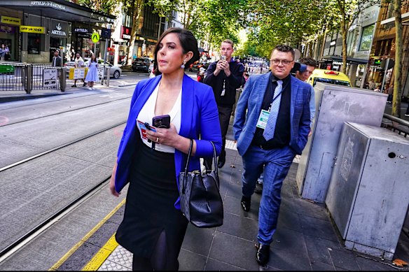 Moira Deeming and husband Andrew leaving a Liberal party meeting and losing her preselection in Melbourne last weekend.
