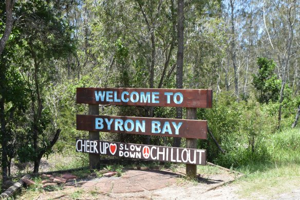 The celebrated  unofficial slogan beneath   the “Welcome to Byron Bay” sign. 