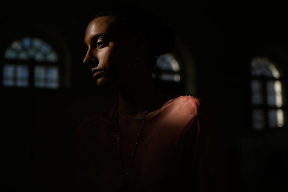 A model is prepared for a runway show at the backstage of the Moscow Fashion Week in Moscow.