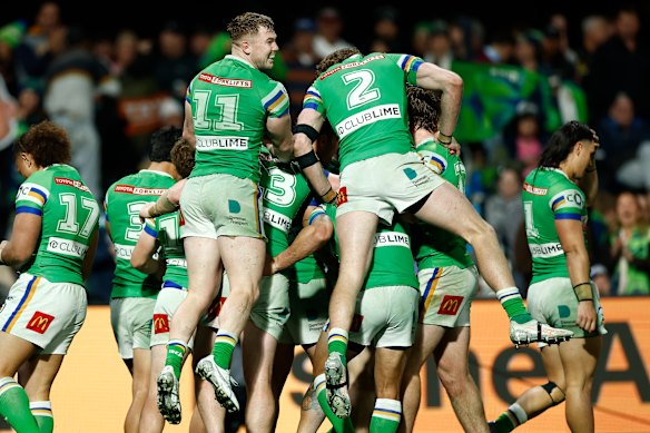 Canberra celebrate a try.